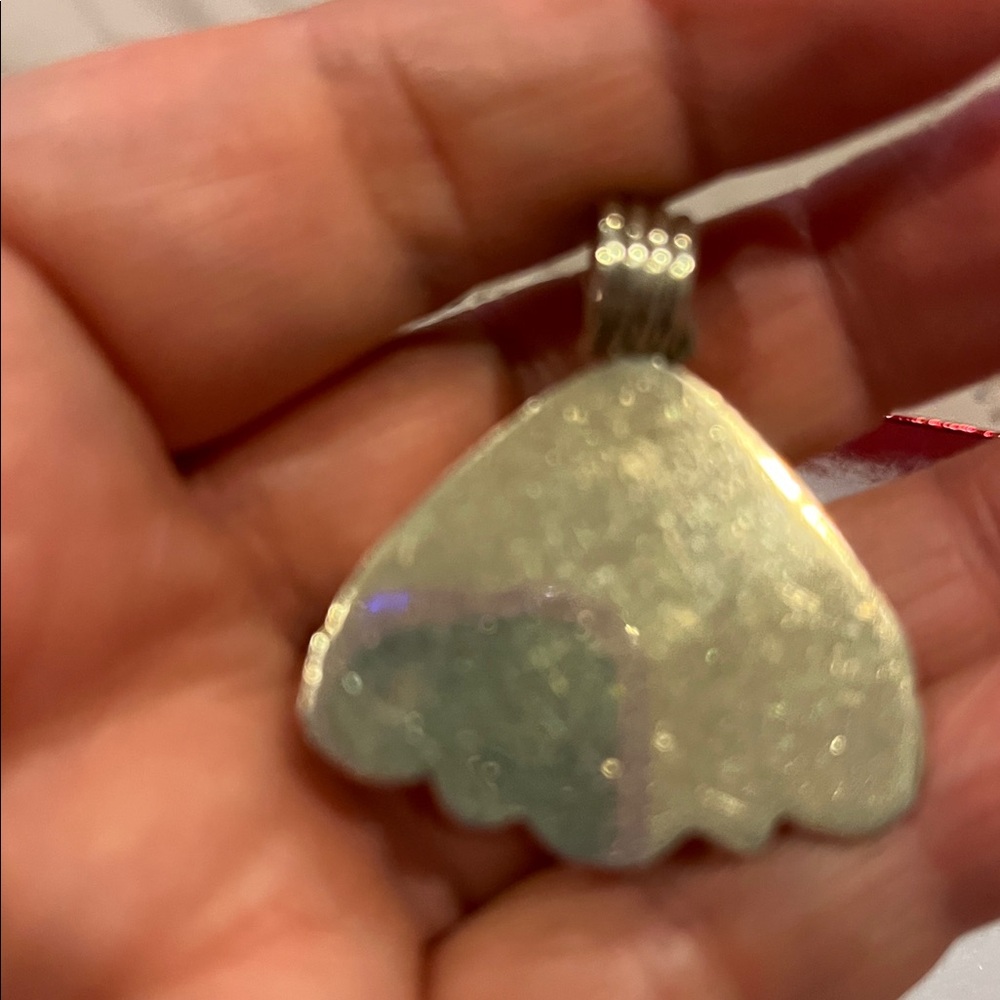 Triangular Amber Pendant With Silver Detailing - image 3